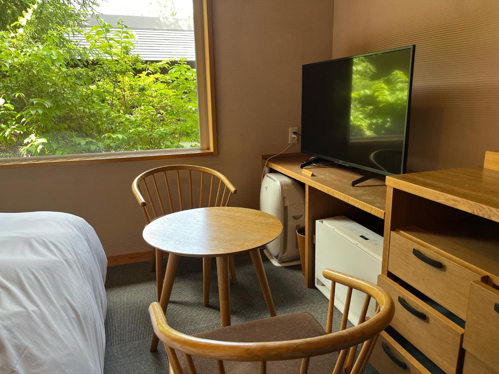 Miyama Ouan Kyoritsu Resort Takayama  Zimmer foto A room at the hotel